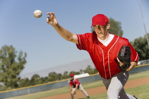 Baseball pitcher throwing a ball