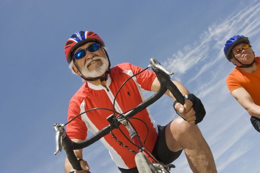 Senior men cycling