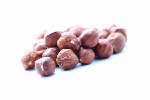 hazelnuts on a white background close-up