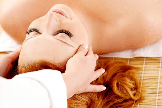 Female getting a head massage