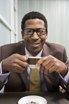Portrait of an African American man drinking coffee
