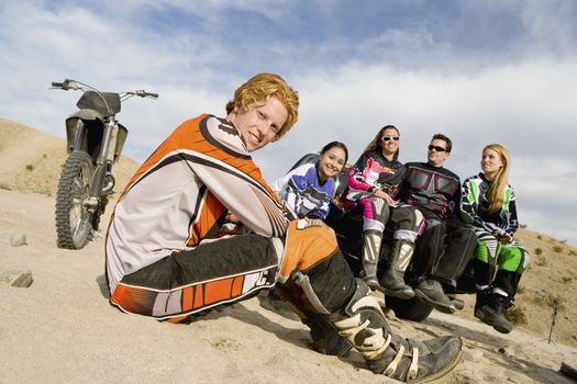 Motocross racers in desert (portrait)