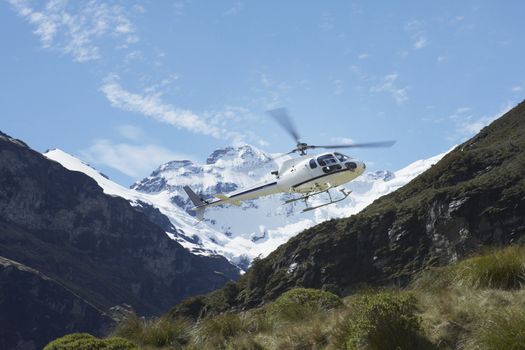 Helicopter Over Mountains