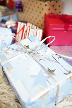 Closeup of Christmas gifts wrapped with bow