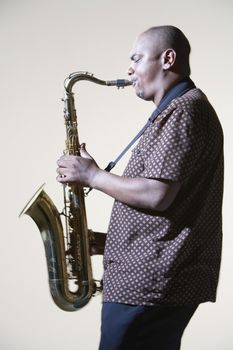 Man Playing Saxophone side view