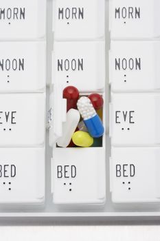 Pills in open container