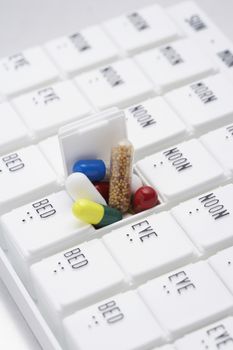 Pills in open container