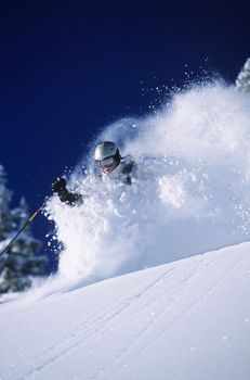 Skier in deep powder snow
