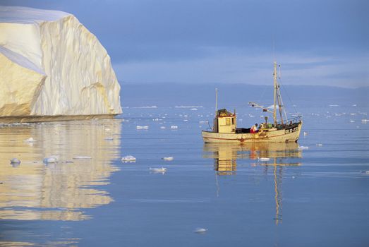 Fishing Boat on Ocean by Iceberg