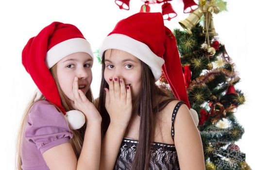 Girls sharing each other secrets on Christmas Eve