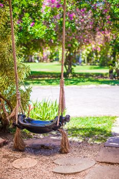 Close-up of a beautiful swing in the garden