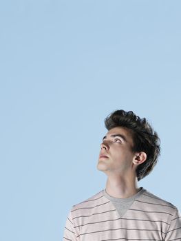 Young man looking up