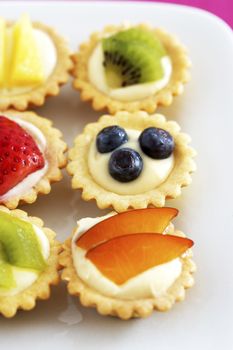 Close-up of mini fruit cupcakes elevated view