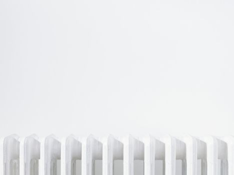Close up of radiator against white wall