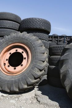 Large group of old tires in recycling center