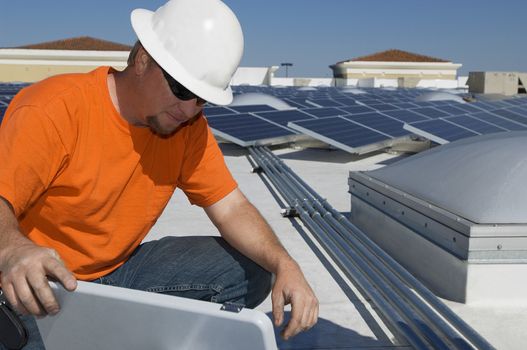 Electrical engineer working at solar power plant