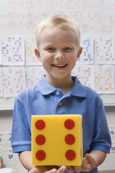 Elementary Student with Large Die