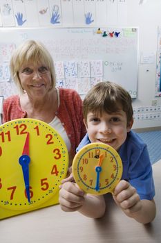 Little Boy Learning to Tell Time