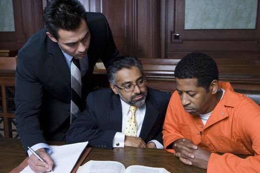 Criminal with two lawyers in court