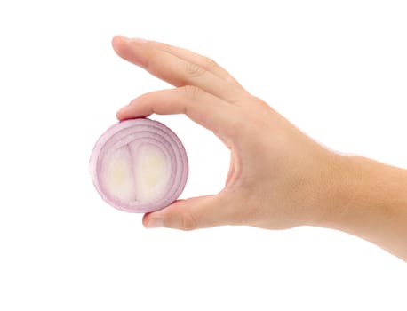 Hand holding onion circle.