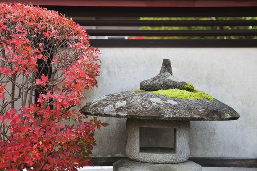 Japan Takayama Stone Lantern and bush in Autumn colors