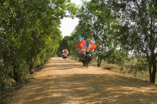 Bicycles with Festive Decorations on a Dirt Road