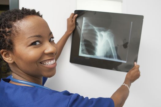 Doctor holding x-ray in hospitalportrait