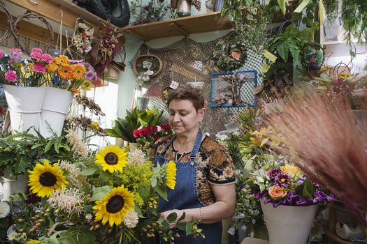 Florist Working in Shop