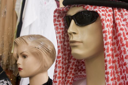 Dubai UAE mannequin display of traditional men‚Äôs headdress gutra at shop in Bur Dubai