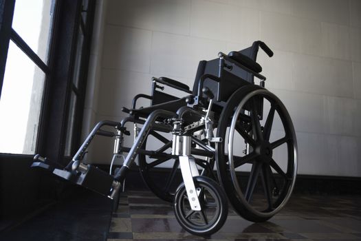 Low angle view of a wheelchair in empty room