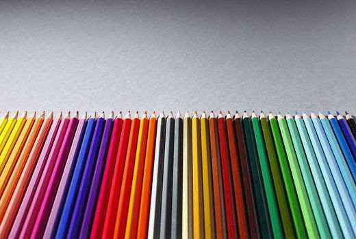 Row of multi colored pencils