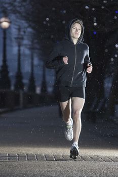 Runner training on early winter morning in London