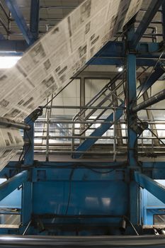 Closeup of newspaper production and printing process