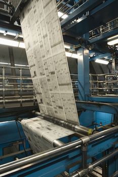 Closeup of newspaper production and printing process