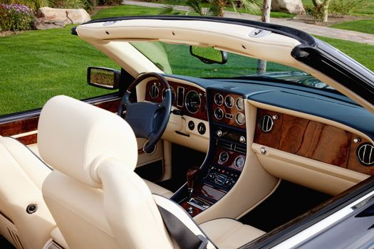Close-up view of luxury car's interior with hi-tech dashboard