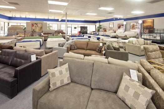 Seating furniture and mattress displayed in store
