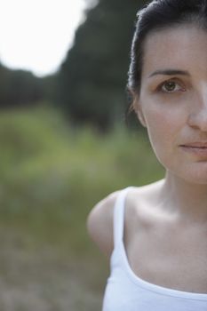Portrait of mid-adult woman outdoors close-up