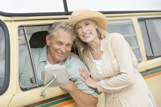 Senior couple with campervan