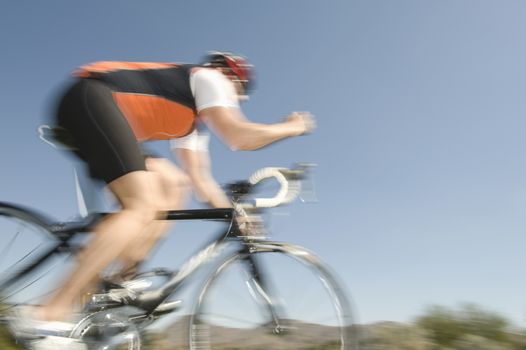 Male cyclist blurred motion