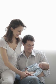 Mother and father with newborn baby