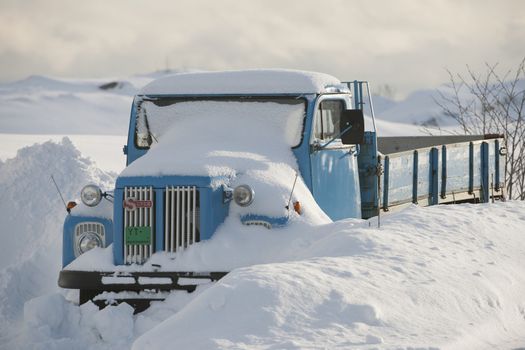 Truck is snowed in Flakstadoya Loftofen Norway