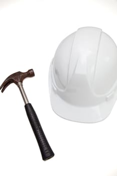 Hammer and hard against white background
