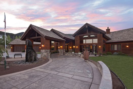 Entrance to a ranch home exterior at dusk
