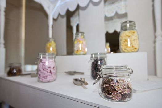 Close-up view of confectionary in glass jars