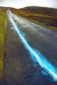 Fiber optic cable running above ground in the British Countryside