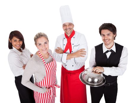 Group of chef and waiters