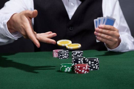 Poker player increasing his stakes
