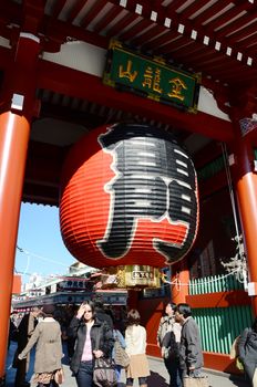 TOKYO, JAPAN - NOV 21: Imposing Buddhist structure features a massive paper lantern painted