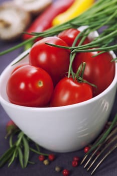 Tomatoes, chives and vegetables