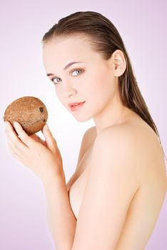 Beautiful woman with coconut